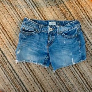 A pair of gene shorts size 3/4 long